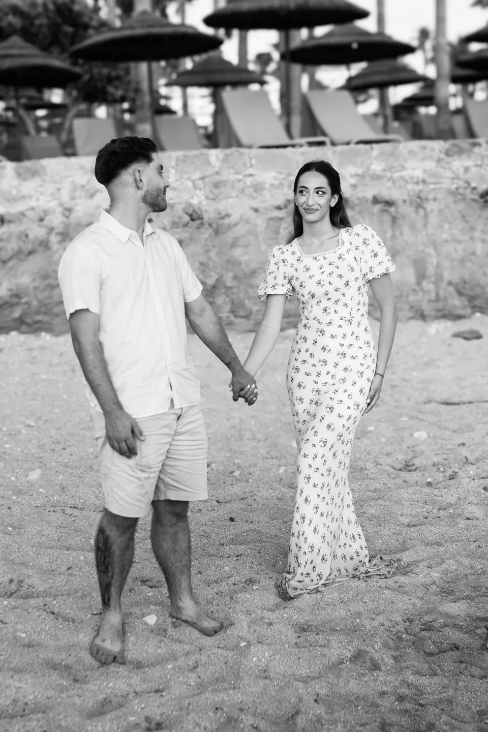 Walking hand in hand on the beach