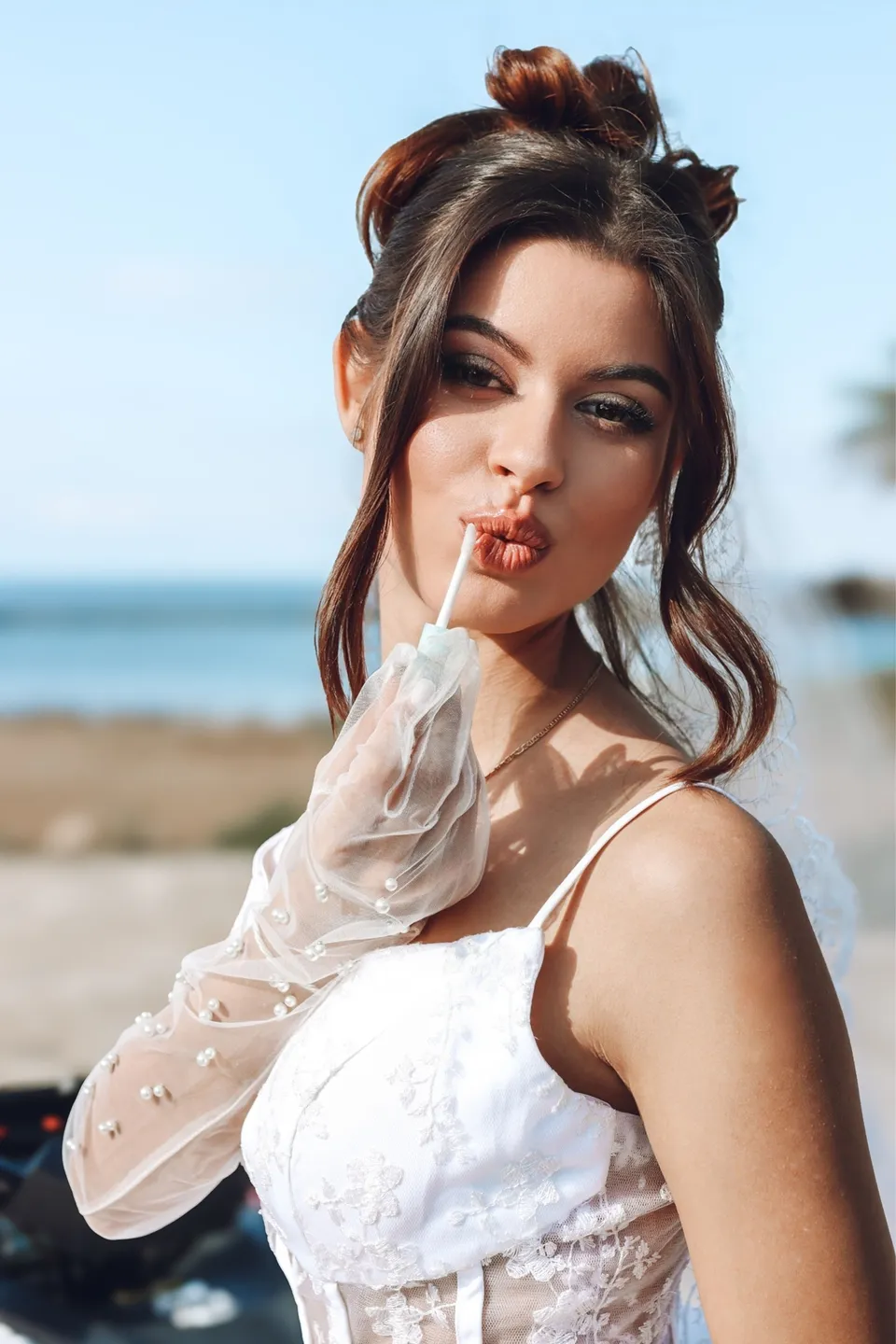 Playful half up style with beach waves