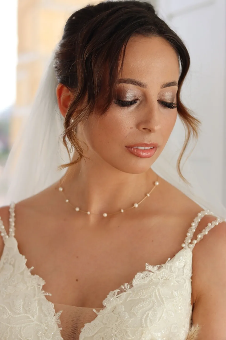 Bridal makeup with pearls and soft eye definition