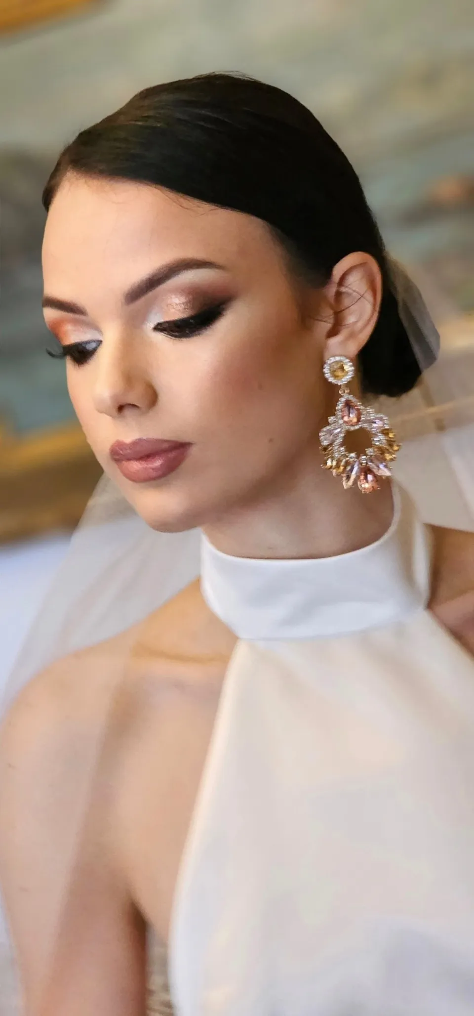 Sleek bridal look with sculpted cheekbones