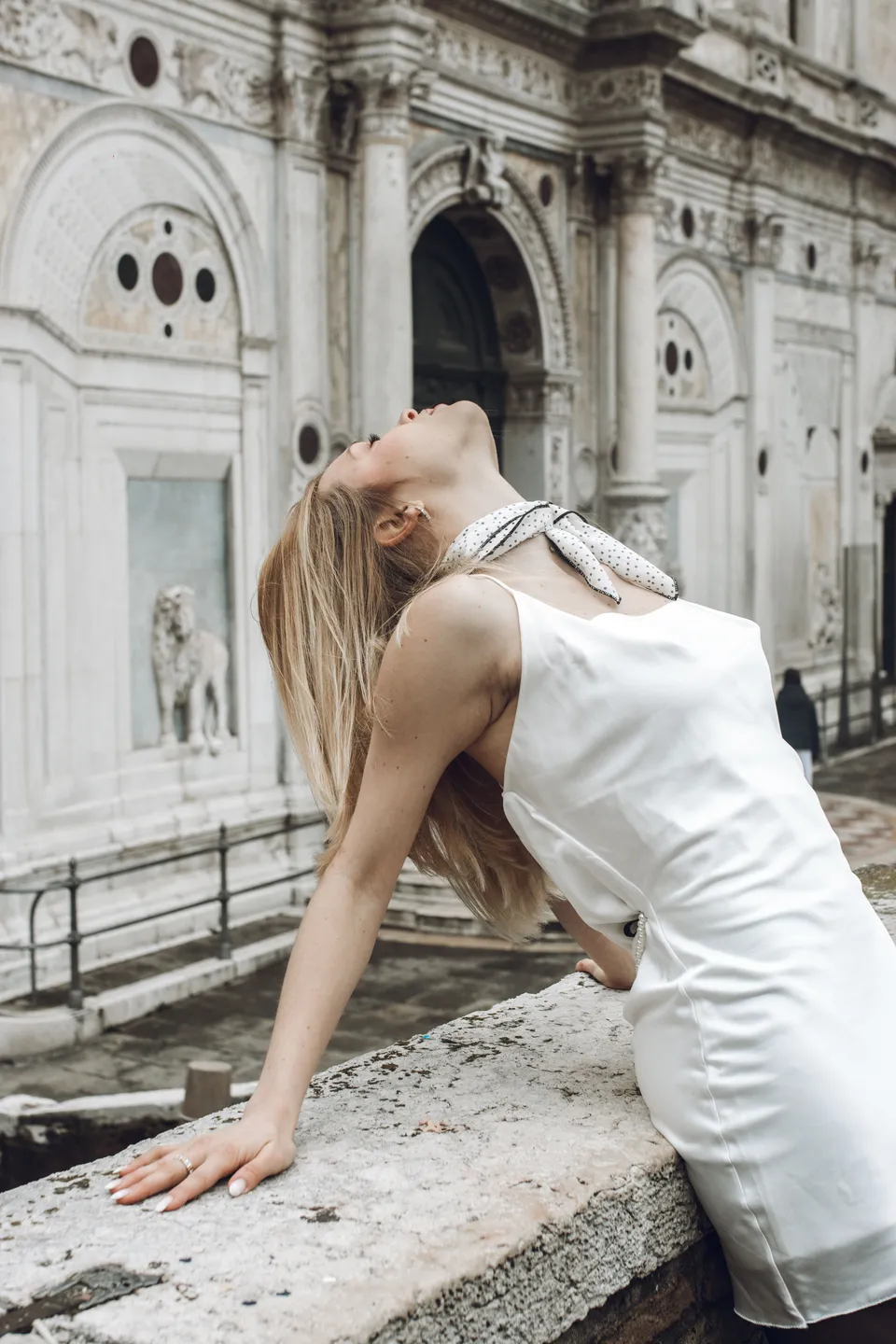 White dress in a Venice square