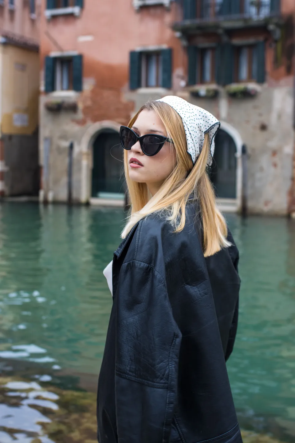 Venice canal portrait with sunglasses